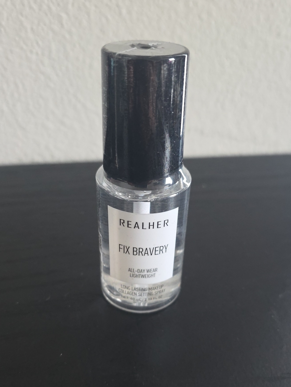 RealHer Fix Bravery Setting Spray in Clear with Black Cap